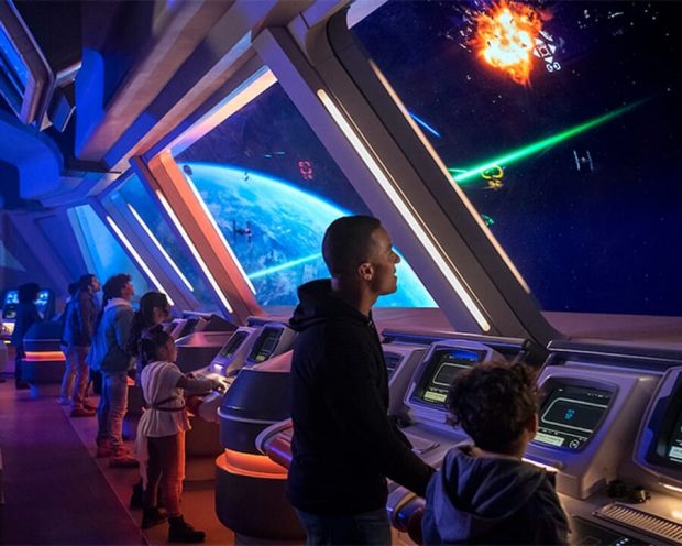 PEOPLE LOOK OUT INTO SPACE ON SITE OF STAR WARS HOTEL CALLED GALACTIC STARCRUISER AT THE WALT DISNEY WORLD RESORT IN FLORIDA