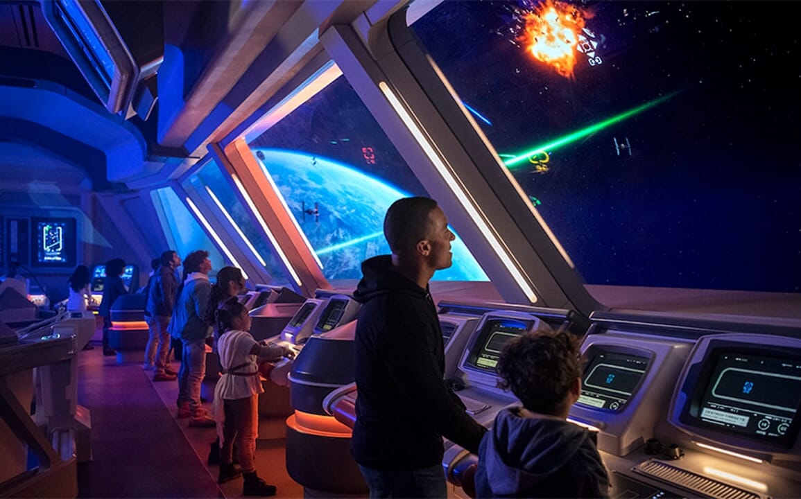 PEOPLE LOOK OUT INTO SPACE ON SITE OF STAR WARS HOTEL CALLED GALACTIC STARCRUISER AT THE WALT DISNEY WORLD RESORT IN FLORIDA