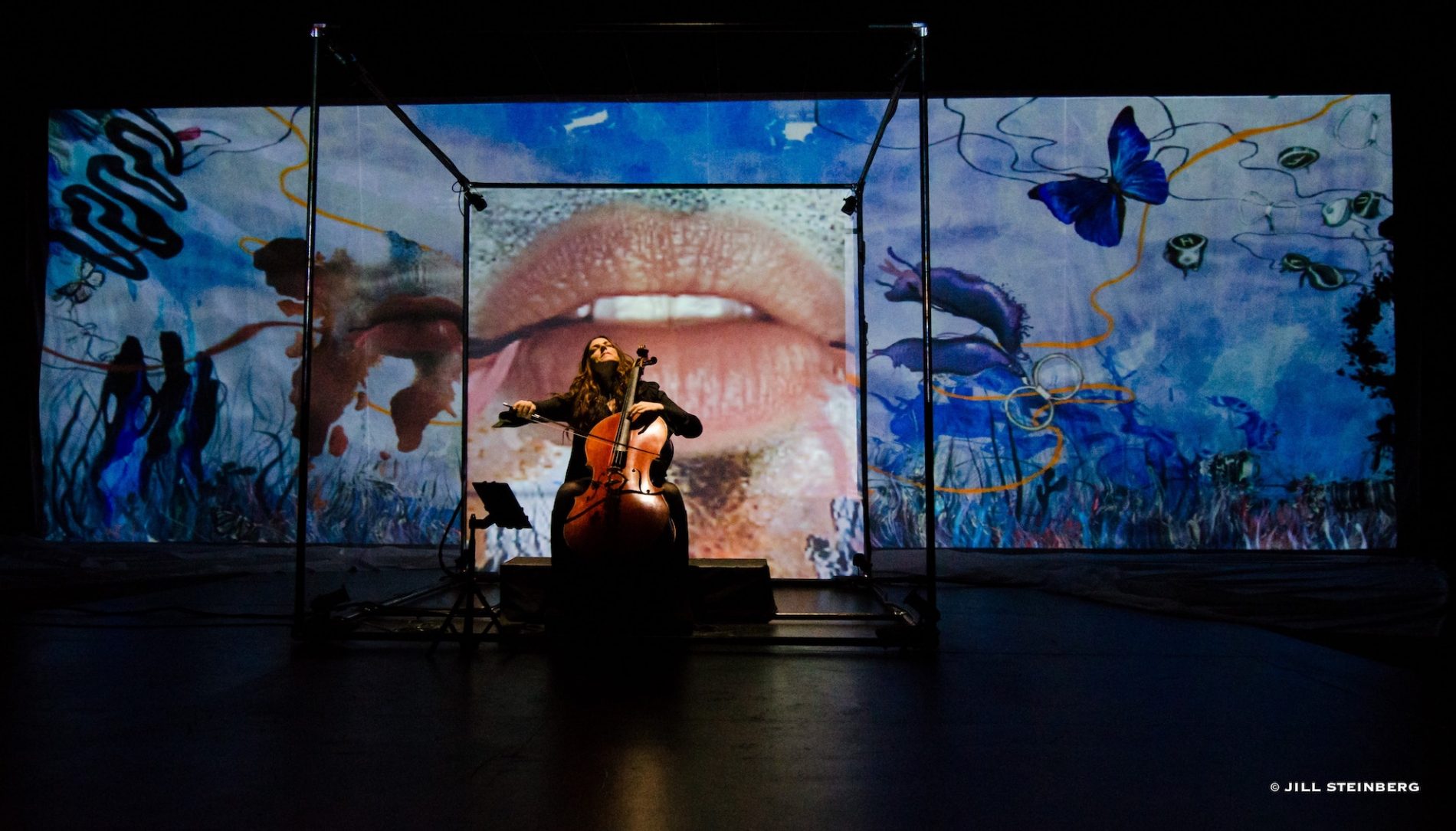 WOMAN PLAYS CLASSICAL MUSIC ON STAGE FOR PAOLA PRESTINI’S LABYRINTH INSTALLATION CONCERTOS: ROOM NO. 35