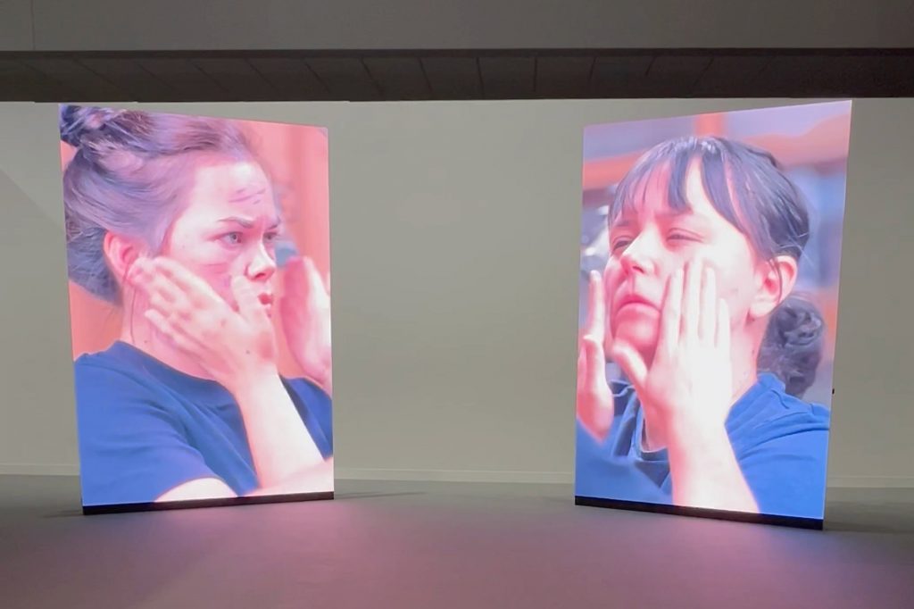 INSTALLATION AT MIAMI ART WEEK BY THE ARTIST OLIVER BEER, WHICH PRESENTED TWO WOMEN SLAPPING EACH OTHER’S FACES IN A PERCUSSIVE BEAT